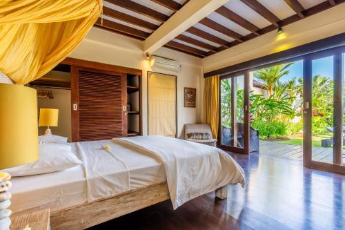 Cama o camas de una habitación en Pristine Yuyu Villa Balian