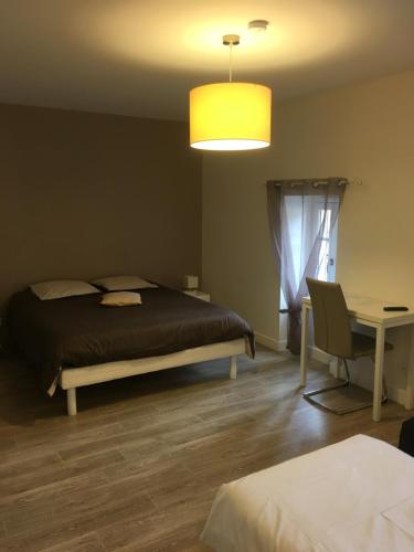 Postel nebo postele na pokoji v ubytování Chambres d'Hôte Les Bredins
