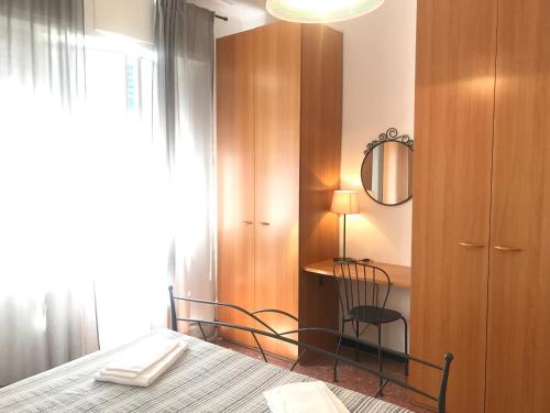 Appartamento Viviana tesisinde bir odada yatak veya yataklar