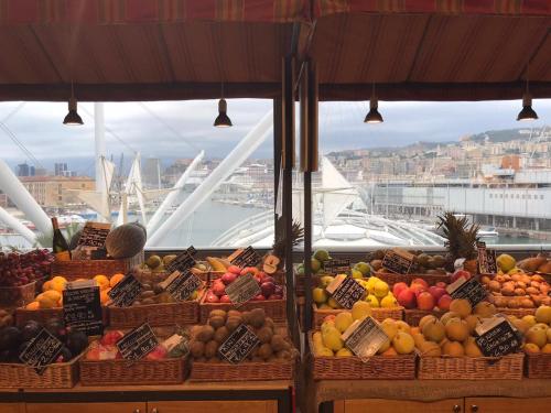 a display of fruits and vegetables in a market at un'oasi di tranquillità in Genoa