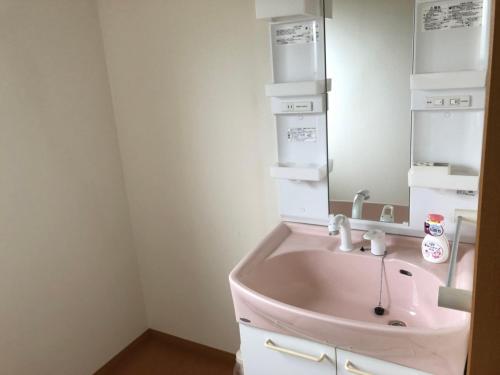 Ванная комната в Ocean Villa Okinoerabu
