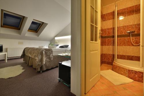 Ένα ή περισσότερα κρεβάτια σε δωμάτιο στο Anette Hotel