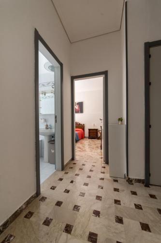 Katil atau katil-katil dalam bilik di Carlentini house B&B
