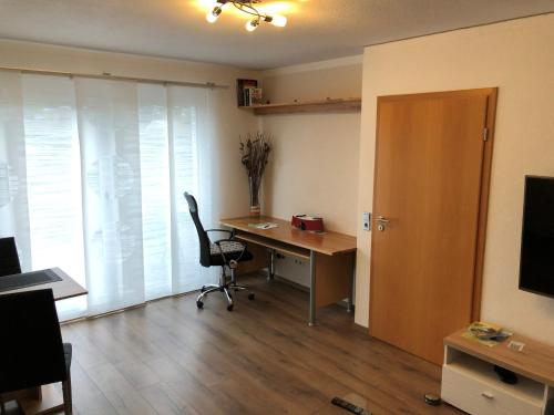 Et tv og/eller underholdning på Ferienwohnung Brigach