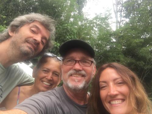 a group of three people posing for a picture at Bella Vista Ranch Ecolodge in Turrialba