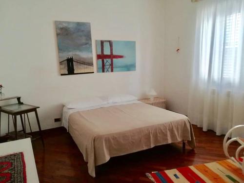 Posteľ alebo postele v izbe v ubytovaní Smile House Castelbuono