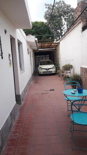 a car parked in a garage with a car parked in it at Alojamiento Milu in Godoy Cruz
