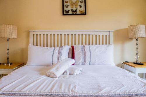 Ένα ή περισσότερα κρεβάτια σε δωμάτιο στο Pro Active Guest House