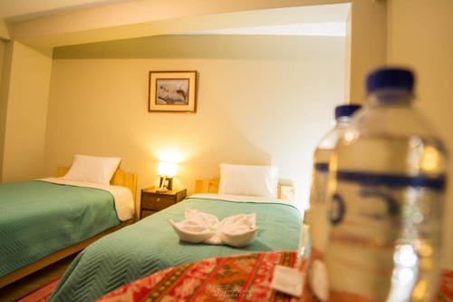 Ένα ή περισσότερα κρεβάτια σε δωμάτιο στο Samaykuy Bed and Breakfast