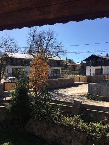 a view from a window of a street with houses at Best Villa in BAKURIANI Center in Bakuriani
