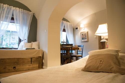 מיטה או מיטות בחדר ב-Colonial ultra center apartment