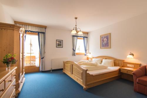 Ένα ή περισσότερα κρεβάτια σε δωμάτιο στο Aparthotel Ederhof