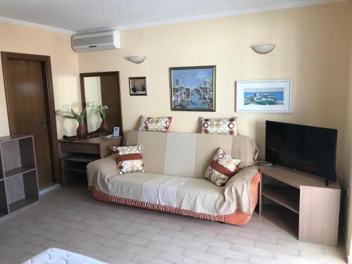 Телевизор и/или развлекательный центр в Apartments Zovko