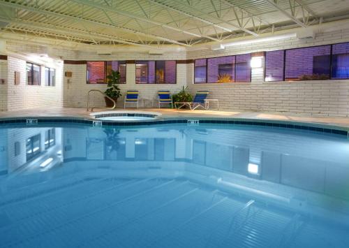 a large swimming pool in a large room at Holiday Inn Express Mesa Verde-Cortez, an IHG Hotel in Cortez