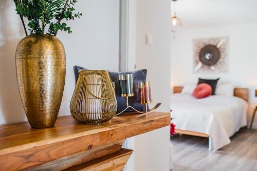 Postel nebo postele na pokoji v ubytování Apartments Nora