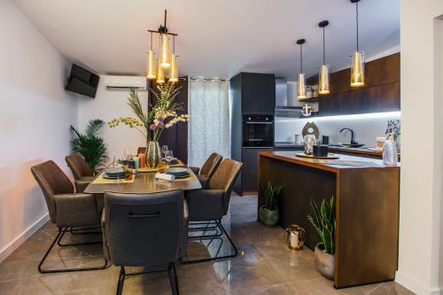 Kuchyň nebo kuchyňský kout v ubytování Apartments Nora