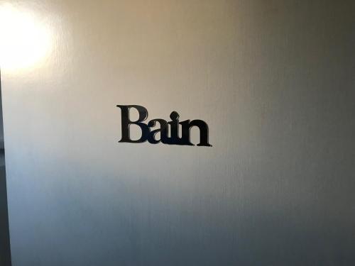 a sign on a wall with the word pain on it at Maison 2Ch - 4 pers en Picardie parking gratuit - by La Source d'OrFée in Courcelette