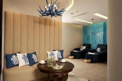 Χώρος καθιστικού στο Sofiana My Khe Hotel & Spa - Rooftop Pool Bar - Free Craft Beer and 20 minute Spa per Room