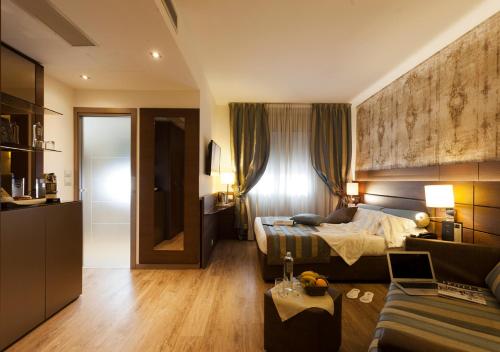 En eller flere senge i et værelse på LH Hotel Sirio Venice