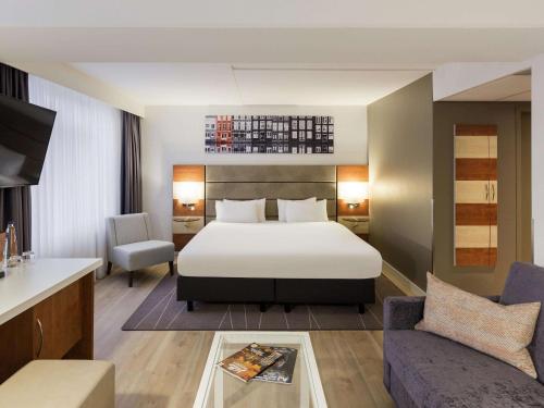 เตียงในห้องที่ Mercure Hotel Amsterdam West