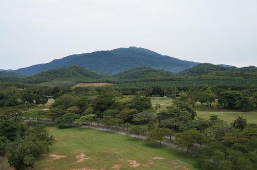 an aerial view of a park with a mountain in the background at AFamosa Purple Dream Residence Condotel homestay in Melaka