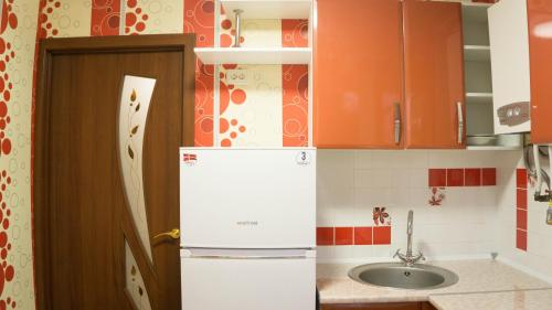 Doba In Ua Yavornitskoho6 Apartments tesisinde mutfak veya mini mutfak