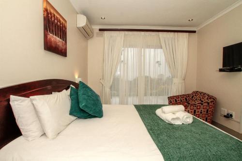 Cama o camas de una habitación en Addis Bed and Breakfast