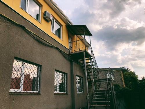 a building with a staircase on the side of it at Annet in Kharkiv