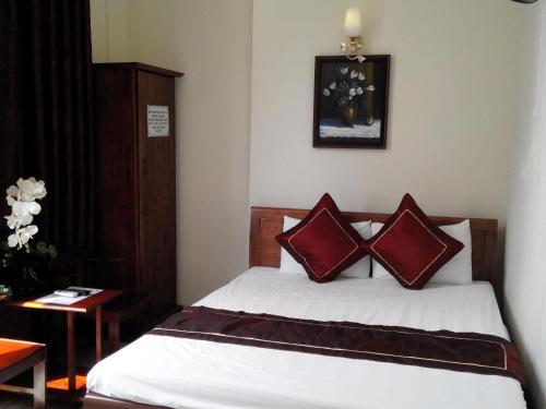 Giường trong phòng chung tại Kara Beachside Guesthouse