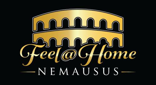 a gold sign for a new home with the words hello karma at Feel@Home Nemausus « Le 4 » in Nîmes