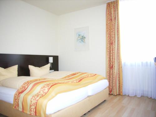 Letto o letti in una camera di Drexel´s Parkhotel