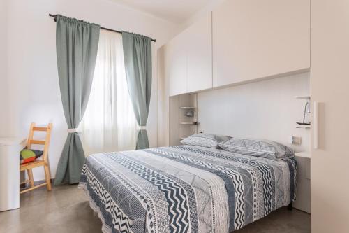 Postel nebo postele na pokoji v ubytování 40° Parallelo Guest House