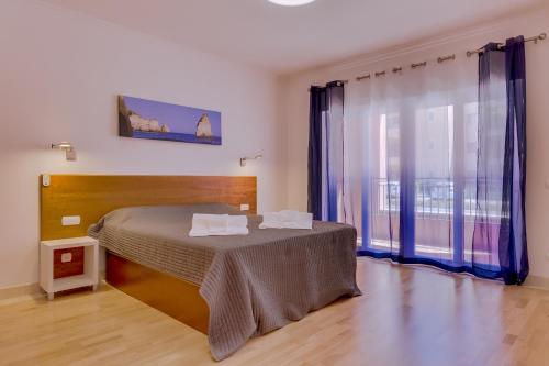 Cama ou camas em um quarto em Victoria Boulevard - Vasco da Gama - Vilamoura