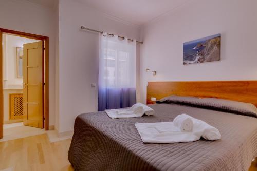 Posteľ alebo postele v izbe v ubytovaní Victoria Boulevard - Vasco da Gama - Vilamoura
