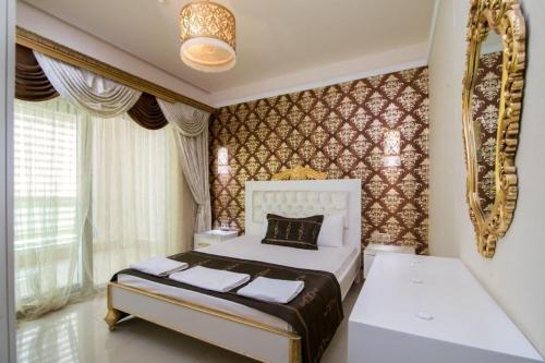 Кровать или кровати в номере Arya Termal Hotel