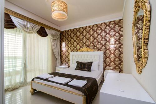 Postel nebo postele na pokoji v ubytování Arya Termal Hotel