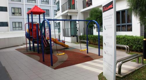 a playground in front of a building at CozySoho-Cyberjaya,Netflix provided,fit 5pax in Cyberjaya