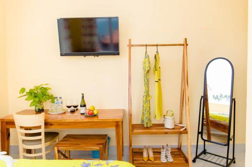 Song Huong Hotel Mui Neにあるテレビまたはエンターテインメントセンター
