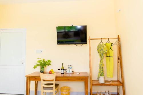 Song Huong Hotel Mui Neにあるテレビまたはエンターテインメントセンター