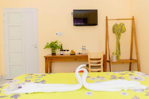 Song Huong Hotel Mui Neにあるテレビまたはエンターテインメントセンター