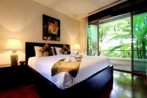 Postel nebo postele na pokoji v ubytování Kata gardens 2bedroom holiday apartment 8A