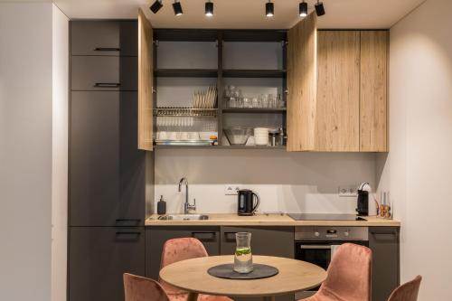 Η κουζίνα ή μικρή κουζίνα στο Apartment Hotel Laisve