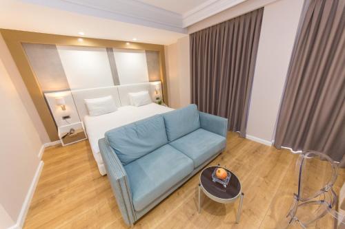 Postel nebo postele na pokoji v ubytování Hotel Brilant Saranda