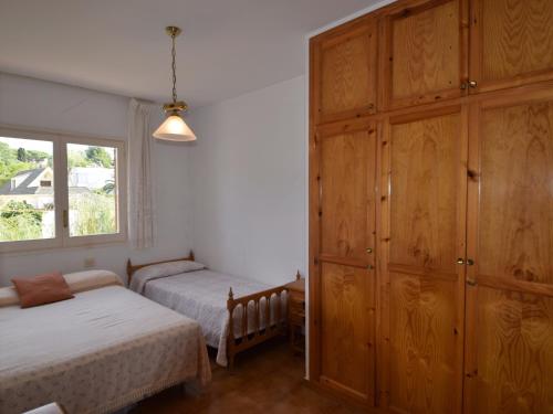 Posteľ alebo postele v izbe v ubytovaní Voramar CostaBravaSi