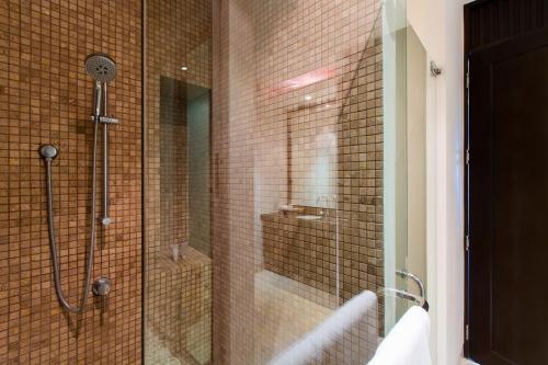 A bathroom at Kata gardens penthouse seaview with rooftop pool 8C