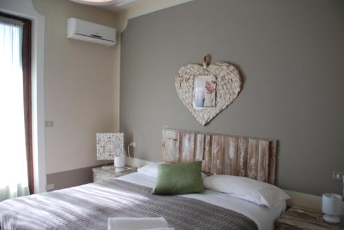 Postel nebo postele na pokoji v ubytování Hotel Andreis
