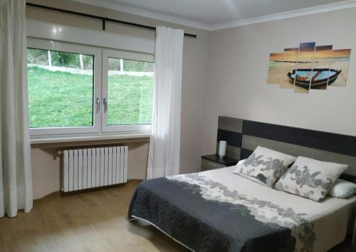 Postel nebo postele na pokoji v ubytování LA SERONDA