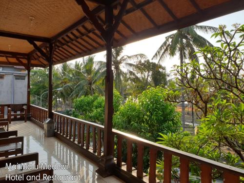 a view from the porch of the hotel and restaurant at Mai Malu in Pulukan