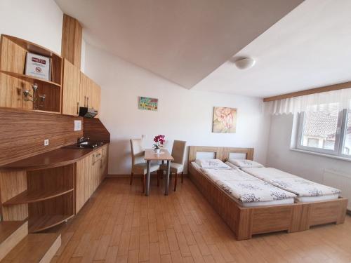 Postel nebo postele na pokoji v ubytování Hostel Novak