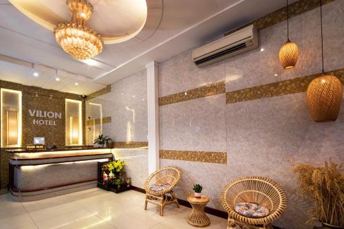 Khu vực ghế ngồi tại Vilion Central Hotel & Spa